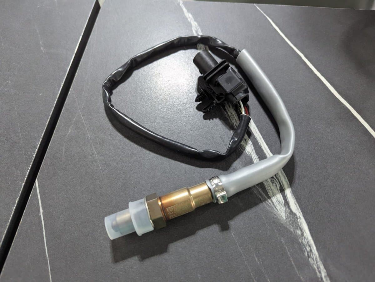 https://imagenes-inventario-quinpart.s3.us-east-1.amazonaws.com/productos/19565/1763137514000-sensor_de_oxigeno_af_para_hyundai_enlantra_4.jpeg